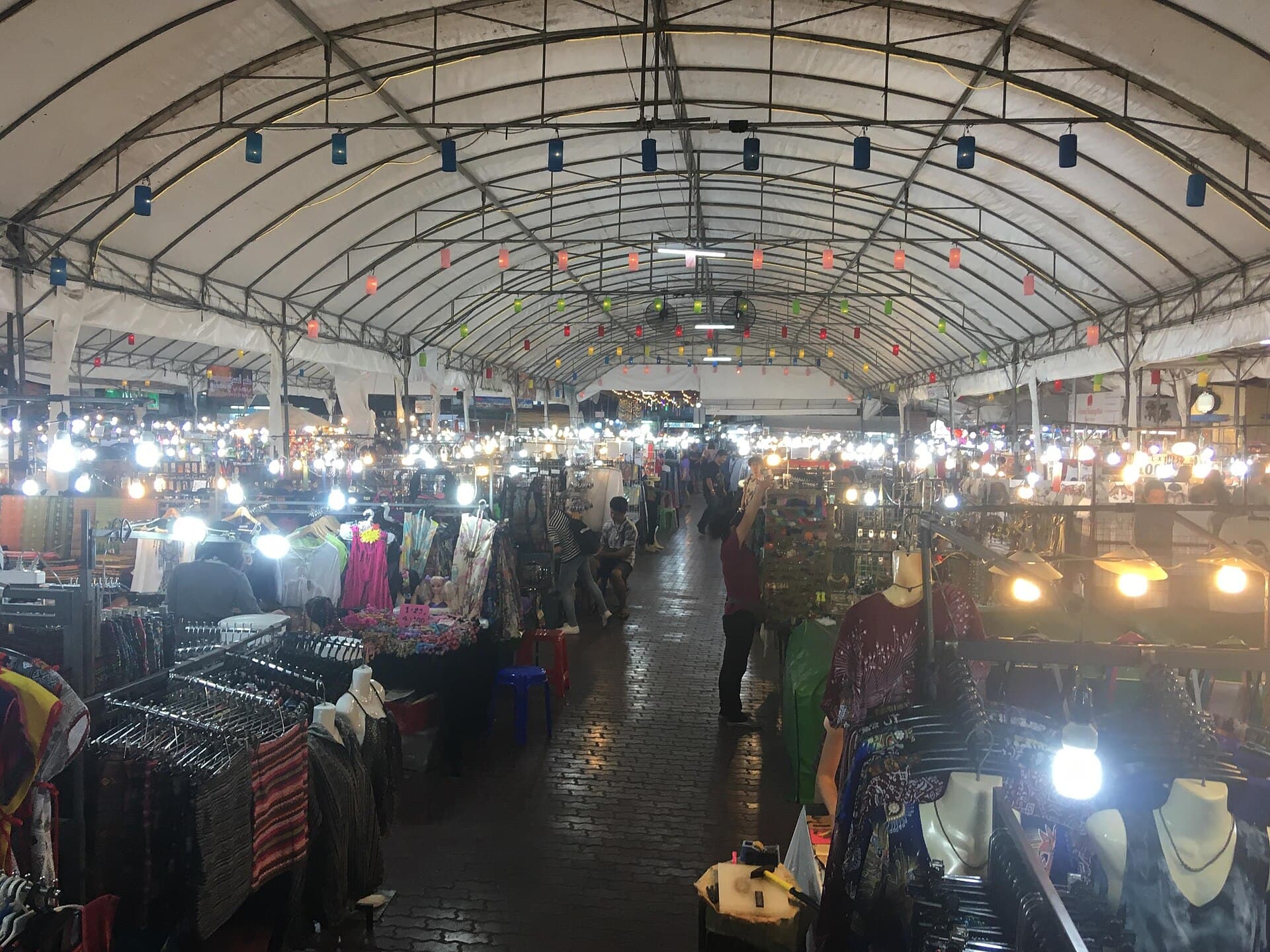 Chiang Mai Night Bazaar with stall lights and evening crowds