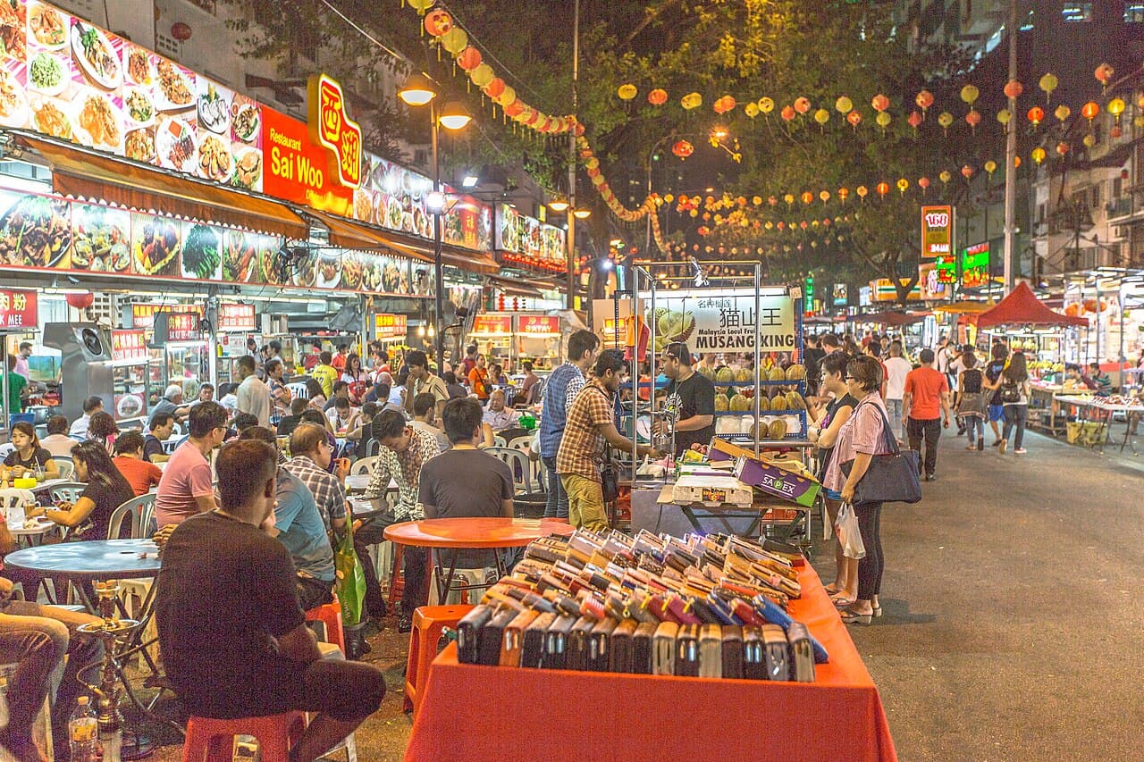 Evening food stalls and diners along Jalan Alor in Kuala Lumpur, photographed in April 2015