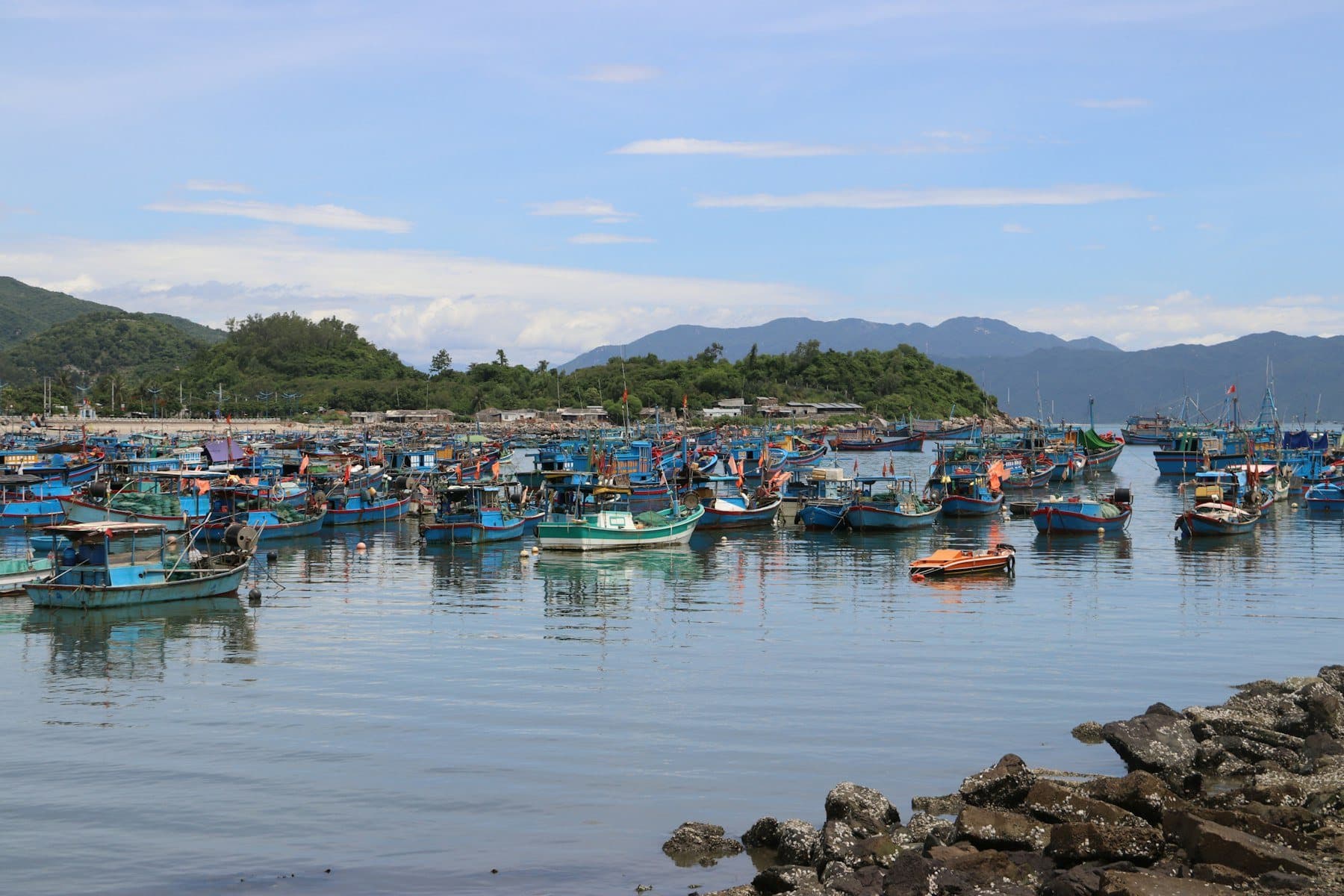 Blue fishing boats anchored in Nha Trang Bay